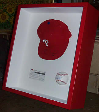 framed Chase Utley signed baseball & cap at Station Gallery