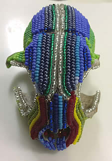 Anne Oldach beaded skull at Station Gallery